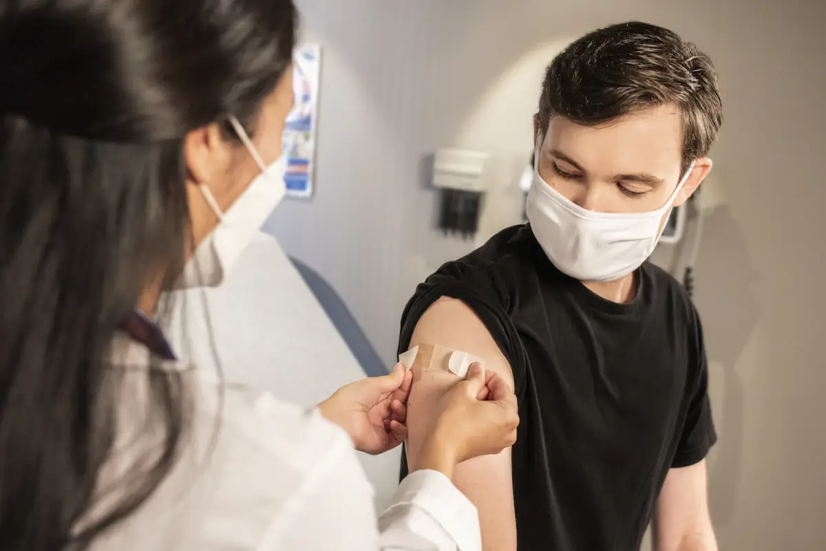 Certified nurse performing an at-home blood draw
